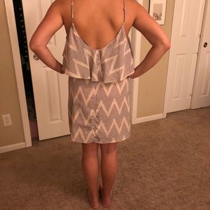 Dress with adjustable straps and low back